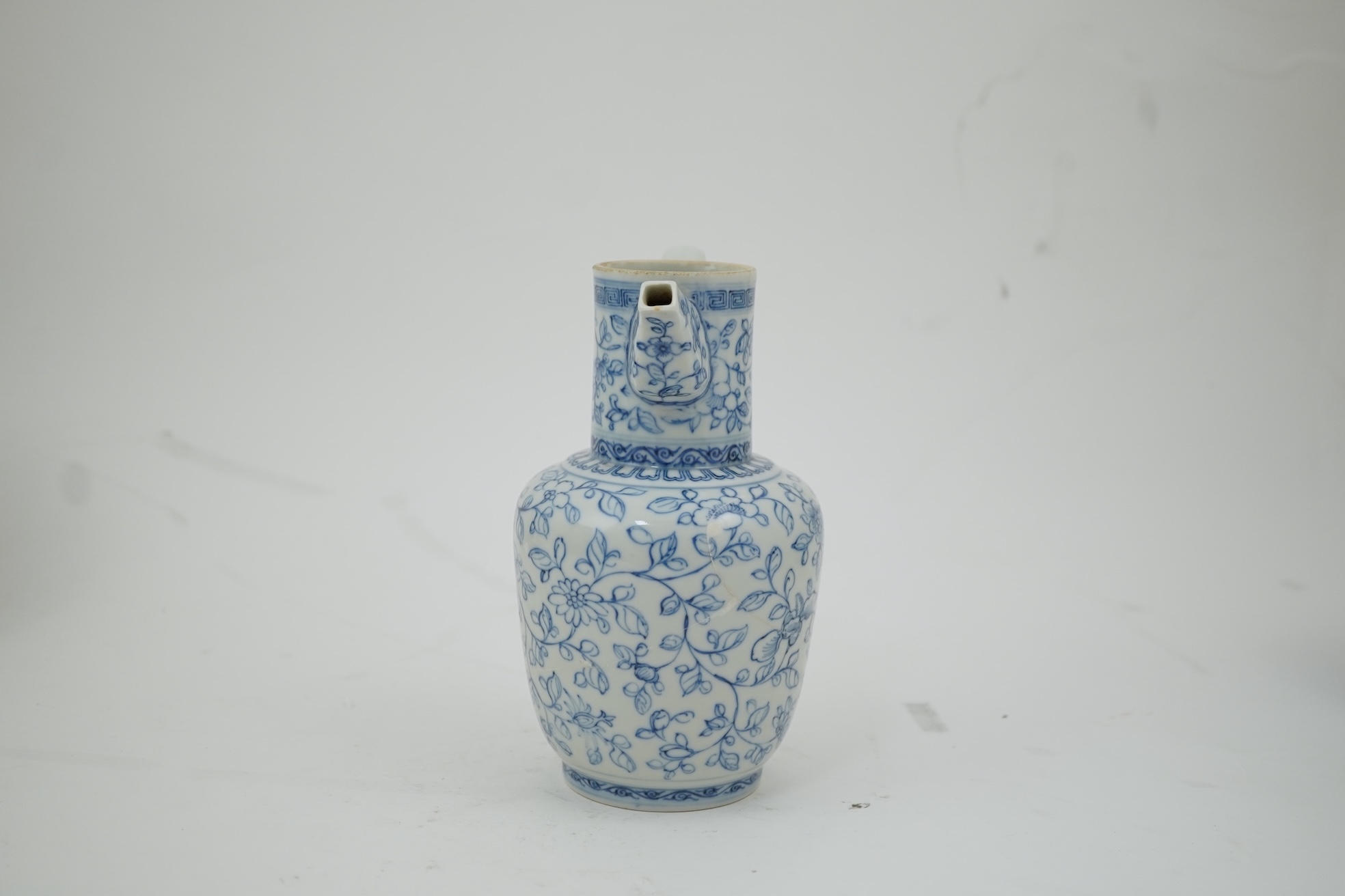 A Chinese blue and white ewer, Hongzhi mark, probably Qing dynasty